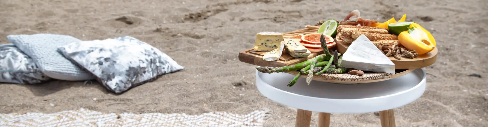 A plate of local seafood on a waterfront table on the Outer Banks